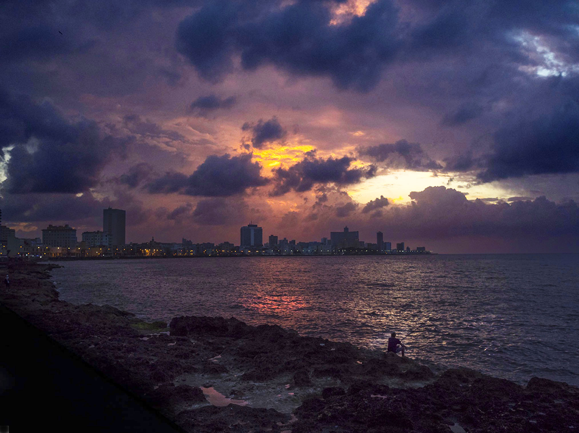 Havana, Cuba-Fisherman and Skyline